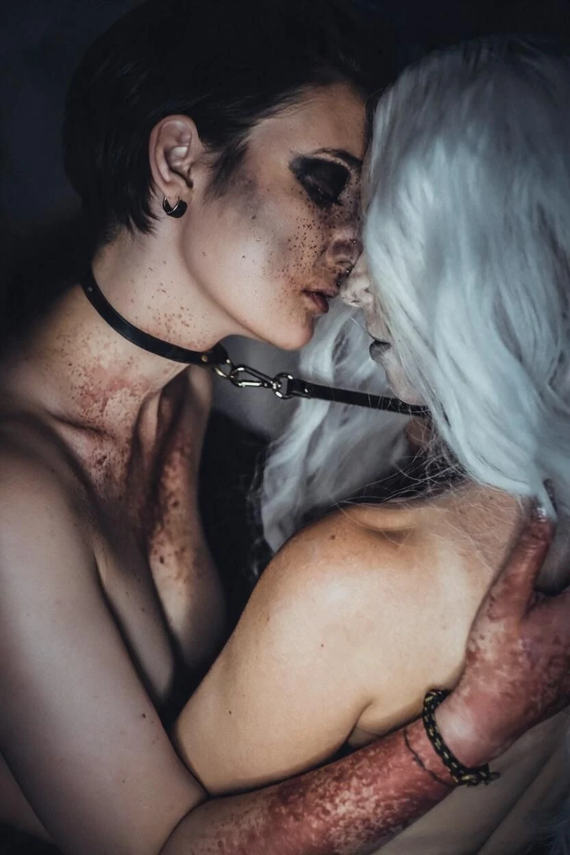 Moody alternative aesthetic creator portrait with artistic styling and leather collar